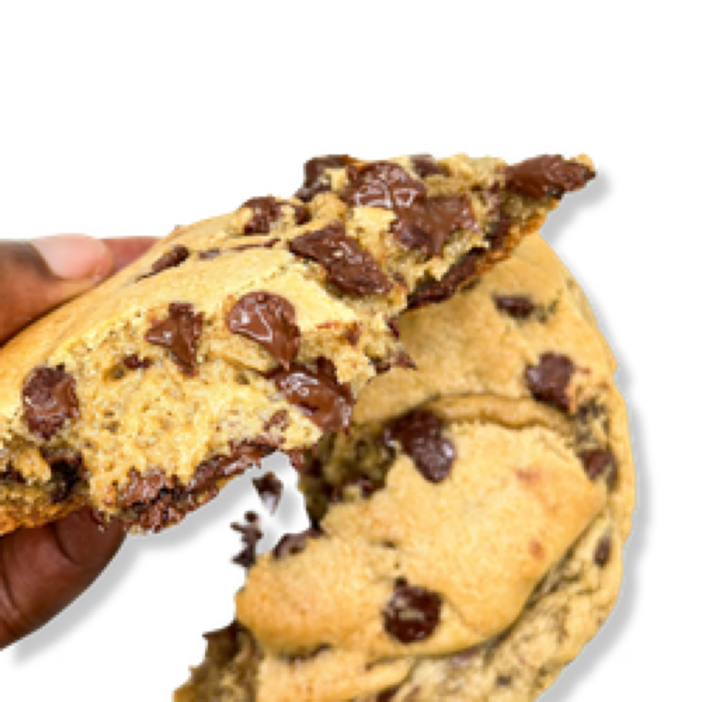 Chocolate chip cookie pulled apart with melted chocolate